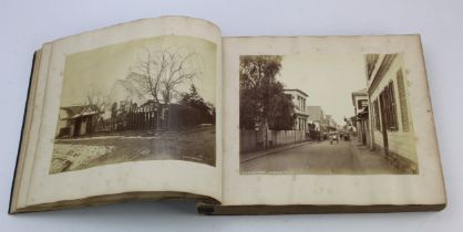 Japanese interest. A large photograph album containing twenty-four black & white photographs of