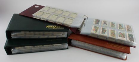 Collection of approx 52 compete sets contained in 4 modern albums, cigarette & trade issues, issuers