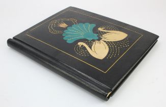 Book Binding interest. A large custom made black morocco binding, decorated with swans and gilt