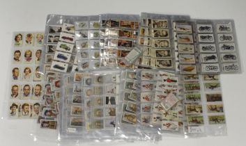 Collection of better cigarette cards sets, approx 25 sets mainly in pages, within a crate, needs