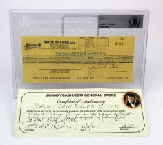 Johnny Cash signed cheque (check), dated 29/11/82, comes sealed in a Beckett Grading Services hard