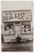 Postcard, USA, a rare RP of OK Real Estate Co. Shop Front, Portland Oregon, the image is good enough