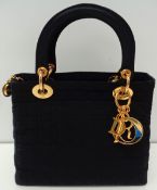 Designer Handbag, Christian Dior Lady Dior black quilted fabric handbag with 2 hand grips and red