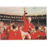 Football autograph, Bobby Moore, World Cup England 1966, iconic colour image showing Moore being