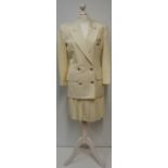 Christian Dior, a cream 2 piece jacket with pleate