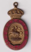 Horseracing, Sandown, members badge for 1884, red enamel decoration, oval shaped with crown to