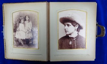 Photographs, a Victorian leather album containing 44 cartes de visite and cabinet cards showing