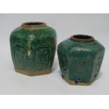 A 20th century octagonal green glazed ginger jar - decorated with floral panels, height 15cm,