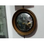 An early 20th century circular convex wall mirror - diameter 42cm.