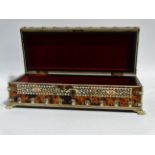 An Anglo Indian glove box - tortoiseshell and bone decorated and raised on paw feet, height 8cm,