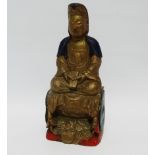 An early 20th century carved buddha - polychrome painted, height 30cm