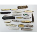 Twenty one various antique and vintage penknives.