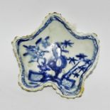 A Bow pickle dish - of leaf form, circa 1754, decorated with a Chinese garden, width 10cm.