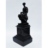 After Michelangelo - a 19th century cast and patinated bronze study of Guiliano de Medici as a Roman