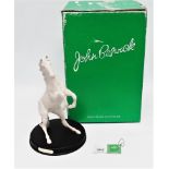 A Royal Doulton horse - John Beswick edition, the rearing horse modelled in white bisque, mounted in