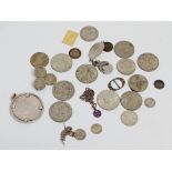 A large white metal mounted coin - together with early 20th century English coinage, including