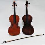 A mid 19th century German violin - lacking bridge and two tuning pegs, length of back 36cm, with