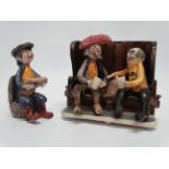 Will Young for Runnaford Pottery - two men on a bench with sea chest, signed to base, width 13cm,