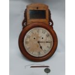 A walnut cased American drop dial wall clock - the cardboard dial set out with Roman numerals,