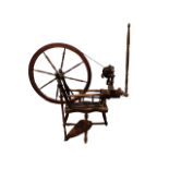 A 20th century spinning wheel - height 110cm.