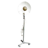 A 20th century photographer's studio light by Malham - the large dished shade on an adjustable