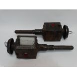 A pair of late Victorian carriage lamps - tinplate painted black with red reflectors to the rear and