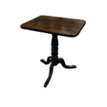 A 19th century mahogany tripod table - the rectangular tilt top above a turned support ending in