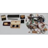 A quantity of costume jewellery - including two strings of pearls, bracelets, necklaces, rings etc.,