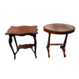 An Edwardian walnut occasional table - the shaped rectangular top on cabriole legs joined by an