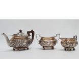 A three piece silver tea service - Edinburgh 1890, Brook & Son, comprising teapot, milk jug and