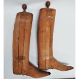 A pair of early 20th century beech boot stretchers - height 57cm