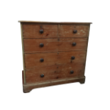 A Victorian pine chest of drawers - with moulded rectangular top with an arrangement of two short