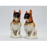 A pair of Russian ceramic bull mastiffs - each seated on an oval base, stamped 'Made in the USSR' to