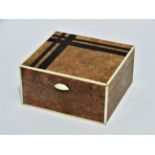 An Art Deco style shagreen cigarette box - the lid with asymetrical geometric decoration, height
