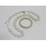 A white jade beaded necklace - with a 9ct yellow gold clasp, length 80cm, together with a jade