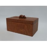 Robert Thompson of Kilburn - a Mouseman rectangular box with lift-off cover, adzed, with carved