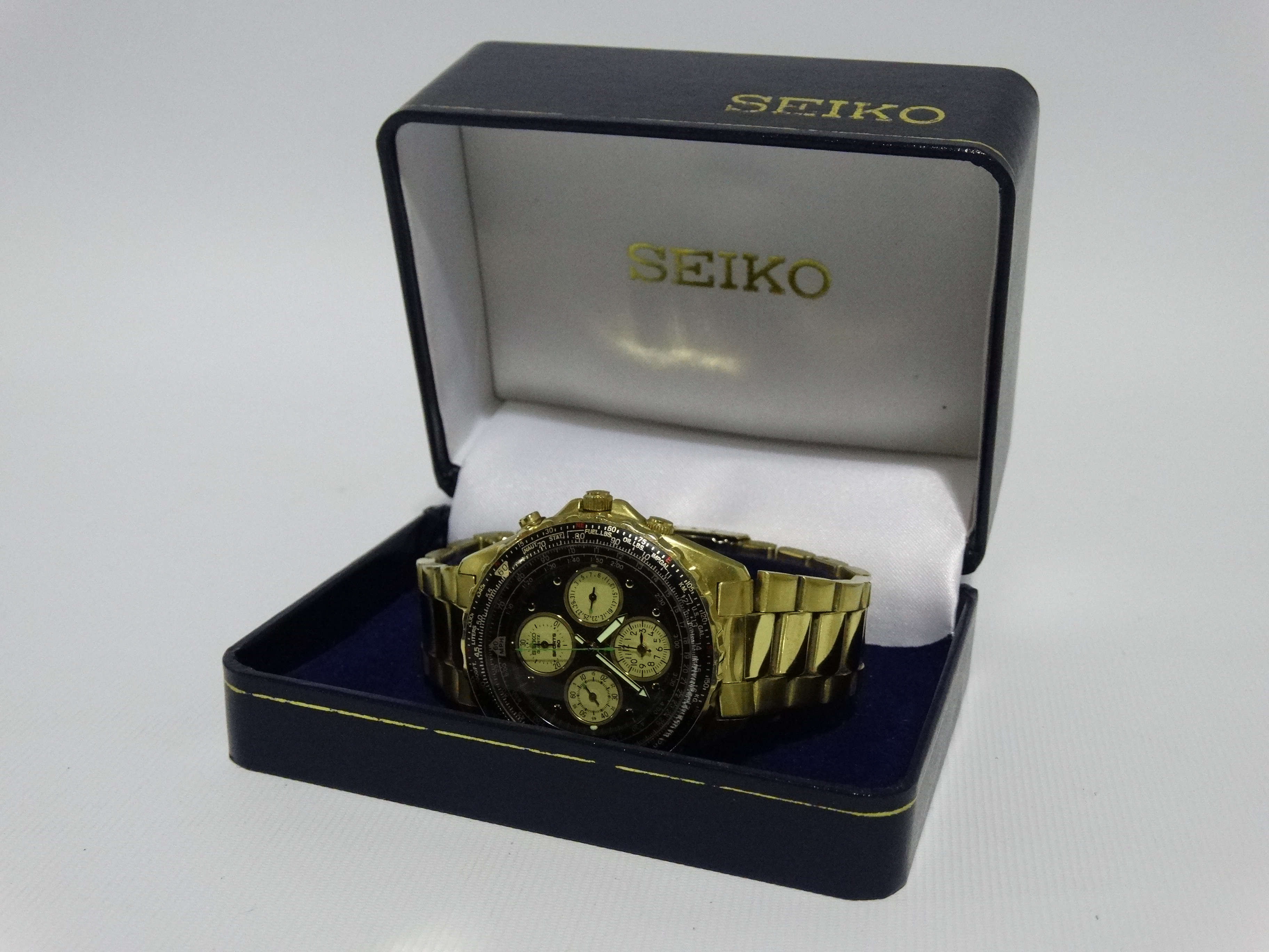 A Seiko Chronograph Rotary Slide Rule Sports 150 - a gilt steel case, the black dial with dots and - Image 2 of 6