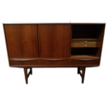 A mid 20th century Danish teak sideboard - by E. W. Bach for Sejling Skabe, with three slide doors