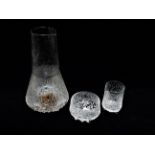 In the manner of Whitefriars - a tall tapering clear glass carafe, height 22.5cm, together with a