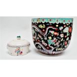 A Poole Pottery butter dish - floral decorated with lug handles, diameter 11cm, together with a