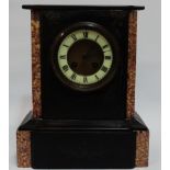 An early 20th century black slate and red marble mantle clock - the ivorine dial set out in Roman
