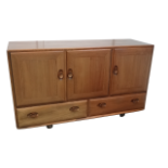 A mid 20th century teak sideboard - in the manner of Gnome, the top with show dovetails, with an