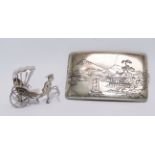 An early 20th century Japanese cigarette case - engraved with scenes of Mt. Fuji, together with a