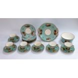 A part porcelain tea set - hand painted with countryside and mountain scenes, comprising six cups,