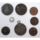 A small collection of coins - to include a Victoria 1887 mounted shilling, Victoria 1½ silver Maundy