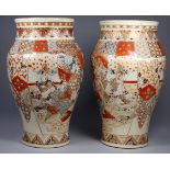 A pair of early 20th century Satsuma vases - of baluster form with tubeline decoration showing
