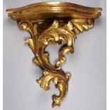 A 20th century carved giltwood bracket - of foliate form, hight 24cm