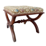 A Victorian walnut X-frame stool - with a square needlework upholstered seat, wide 45cm x deep