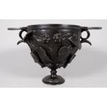 After the antique bronze Roman/Greco skyphos - typical twin handles and decorated with leaves and