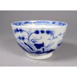 A mid 18th century Caughley tea bowl circa 1780 - the rare blue and white Bridge and Windmill patter